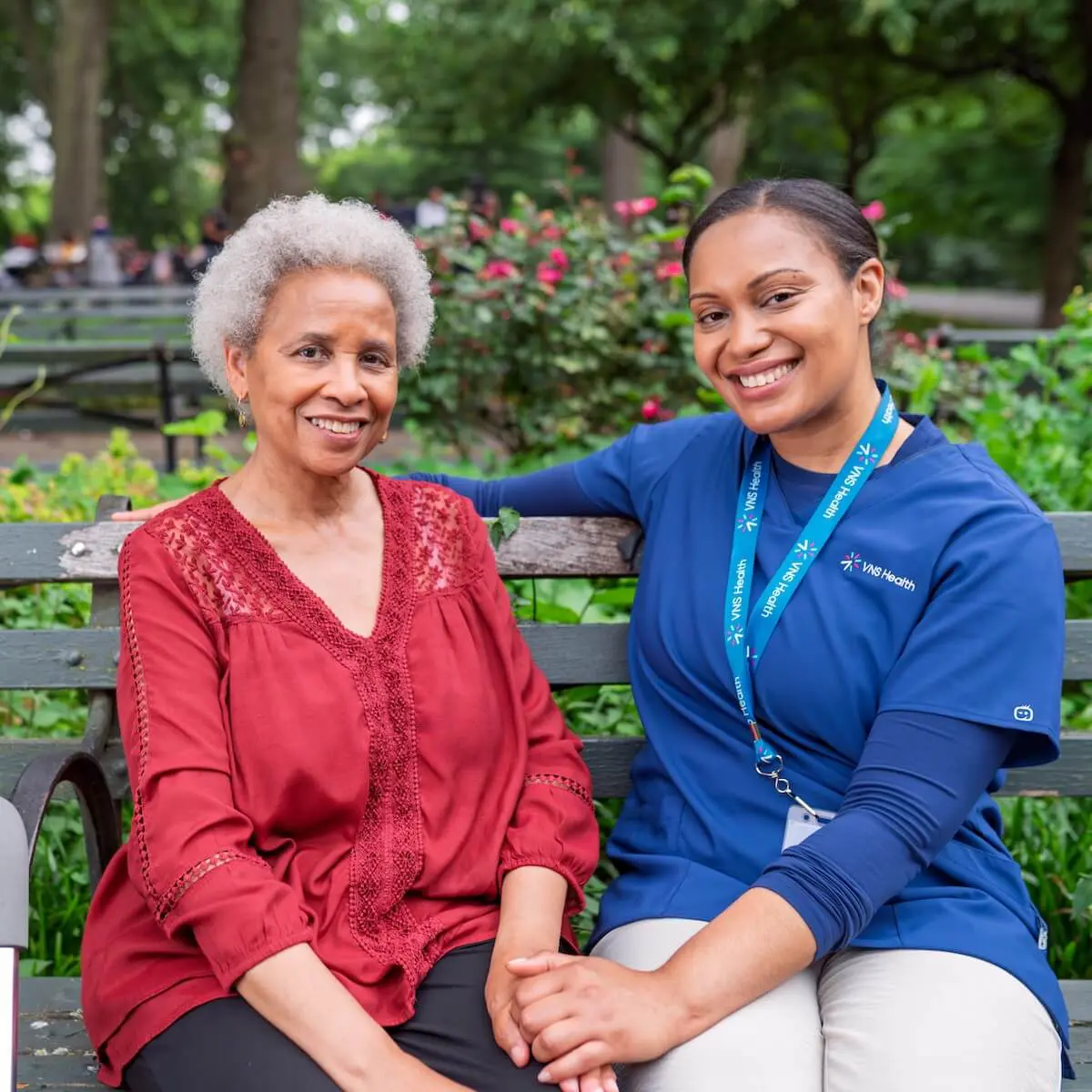 Caregiver sitting with an older woman