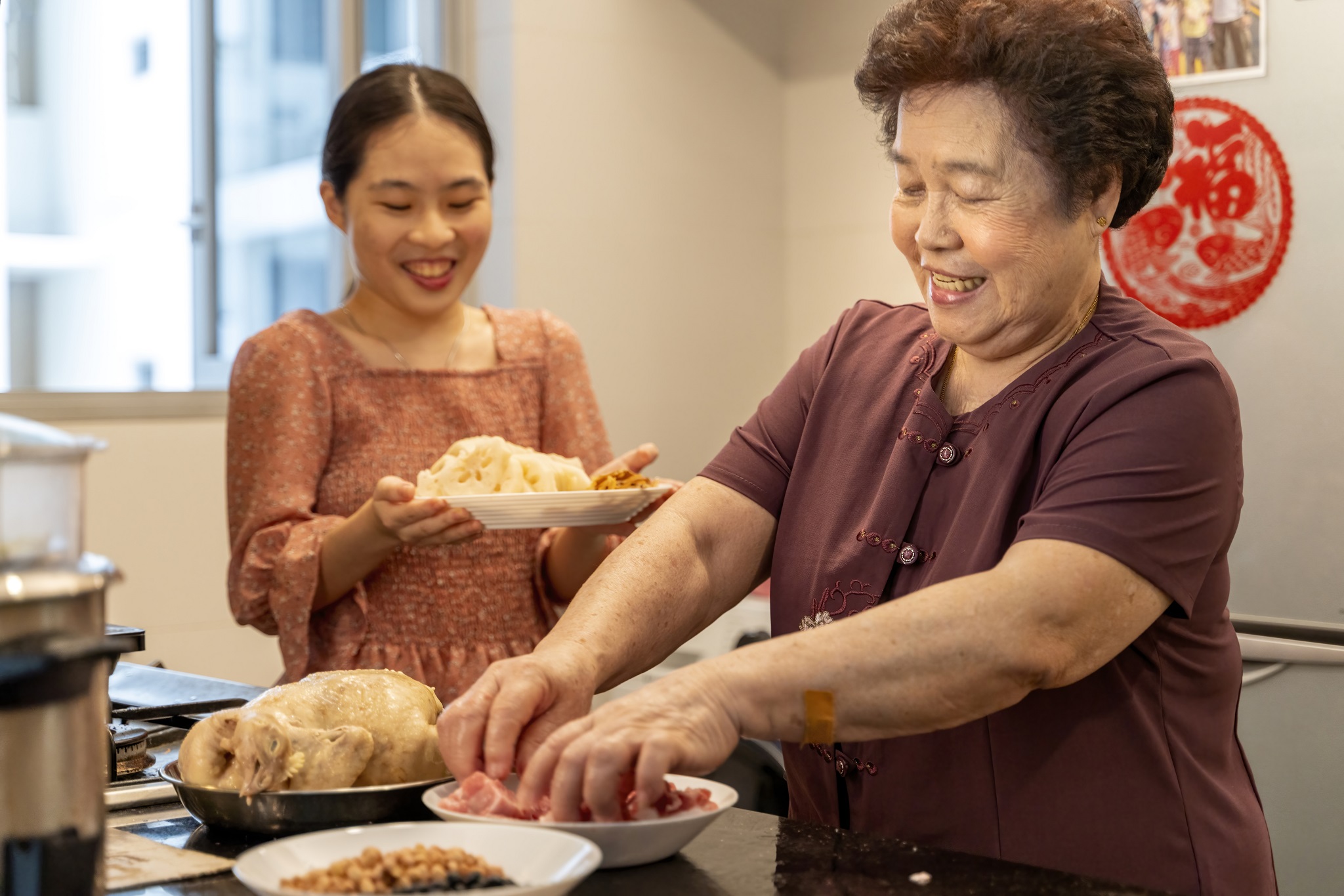Senior adult asian Chinese preparing food